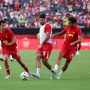 Jul 31, 2024; Philadelphia, PA, USA; Liverpool Dominik Szoboszlai (8) and Curtis Jones (17) and Fabio Carvalho (28) and Kostas Tsimikas (21) practice before action against Arsenal at Lincoln Financial Field.