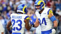 Dec 7, 2025; Glendale, Arizona, USA; Los Angeles Rams running back Kyren Williams (23) reacts with tight end Colby Parkinson (84) after scoring a touchdown during the first half at State Farm Stadium.