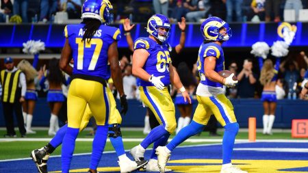 Sep 28, 2025; Inglewood, California, USA; Los Angeles Rams wide receiver Puka Nacua (12) celebrates his touchdown scored against the Indianapolis Colts with center Coleman Shelton (65) and wide receiver Davante Adams (17) during the second half at SoFi Stadium.