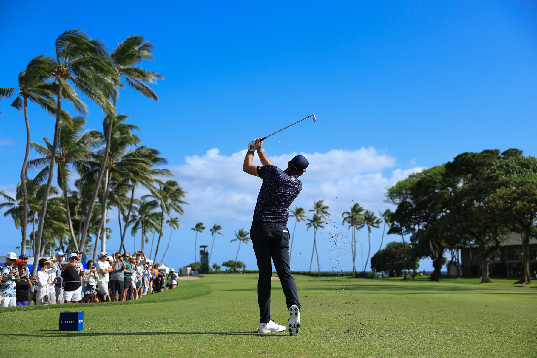 Jan 15, 2026; Honolulu, Hawaii, USA; Keegan Bradley drives on the 11th tee during the first round of the Sony Open in Hawaii.