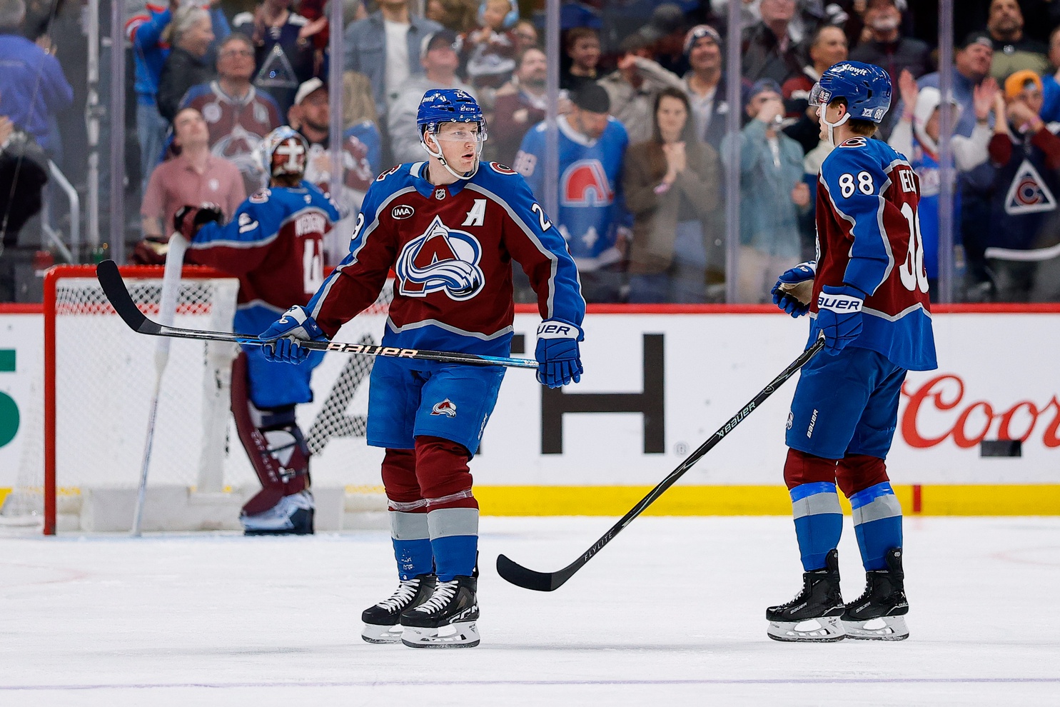 Jan 19, 2026; Denver, Colorado, USA; Colorado Avalanche center Nathan MacKinnon (29) reacts with center Martin Necas (88) after his goal in the second period at Ball Arena.