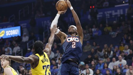 Jan 23, 2026; Oklahoma City, Oklahoma, USA; Oklahoma City Thunder guard Shai Gilgeous-Alexander (2) shoots over Indiana Pacers guard/forward Aaron Nesmith (23) during the first quarter at Paycom Center.
