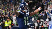 Jan 25, 2026; Seattle, WA, USA; Seattle Seahawks wide receiver Jaxon Smith-Njigba (11) celebrates after scoring a touchdown against the Los Angeles Rams during the first half in the 2026 NFC Championship Game at Lumen Field.