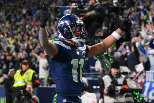Jan 25, 2026; Seattle, WA, USA; Seattle Seahawks wide receiver Jaxon Smith-Njigba (11) celebrates after scoring a touchdown against the Los Angeles Rams during the first half in the 2026 NFC Championship Game at Lumen Field.