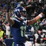 Jan 25, 2026; Seattle, WA, USA; Seattle Seahawks wide receiver Jaxon Smith-Njigba (11) celebrates after scoring a touchdown against the Los Angeles Rams during the first half in the 2026 NFC Championship Game at Lumen Field.