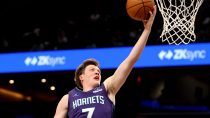 Feb 22, 2026; Washington, District of Columbia, USA; Charlotte Hornets guard Kon Knueppel (7) takes a shot during the second half against the Washington Wizards at Capital One Arena.