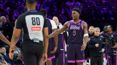 Mar 7, 2026; Minneapolis, Minnesota, USA; Minnesota Timberwolves guard Anthony Edwards (5) reacts to teammates during a timeout agains the Orlando Magic in the third quarter at Target Center.