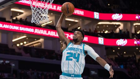 Feb 28, 2026; Charlotte, North Carolina, USA; Charlotte Hornets forward Brandon Miller (24) goes to the basket for a dunk against the Portland Trail Blazers during the first quarter at Spectrum Center.