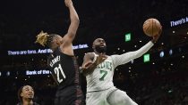 Feb 27, 2026; Boston, Massachusetts, USA; Boston Celtics guard Jaylen Brown (7) drives to the basket past Brooklyn Nets forward Noah Clowney (21) during the second half at TD Garden.