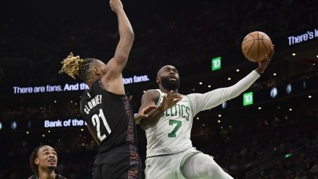 Feb 27, 2026; Boston, Massachusetts, USA; Boston Celtics guard Jaylen Brown (7) drives to the basket past Brooklyn Nets forward Noah Clowney (21) during the second half at TD Garden.