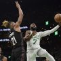 Feb 27, 2026; Boston, Massachusetts, USA; Boston Celtics guard Jaylen Brown (7) drives to the basket past Brooklyn Nets forward Noah Clowney (21) during the second half at TD Garden.