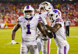 Buffalo Bills wide receiver Emmanuel Sanders celebrates with tight end Dawson Knox and wide receiver Isaiah McKenzie after scoring a touchdown