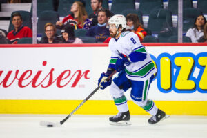 Vancouver Canucks right wing Conor Garland skates with the puck