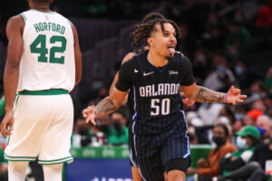 Orlando Magic guard Cole Anthony reacts after making a three pointer against the Boston Celtics