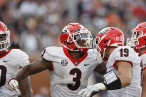 Georgia Bulldogs running back Zamir White on the left celebrates with Georgia Bulldogs tight end Brock Bowers on the right after scoring a touchdown