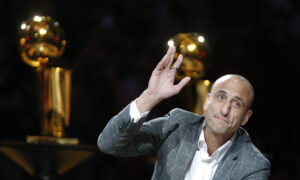 Manu Ginobili acknowledges the fans during his retirement party after the San Antonio Spurs game against the Cleveland Cavaliers at AT&T Center on March 28, 2019 in San Antonio, Texas. 