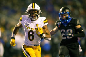 Wyoming Cowboys (6) Xazavian Valladay (RB) breaks free for a long run during a college football game between the Boise State Broncos and the Wyoming Cowboys on November 9, 2019, at Albertsons Stadium in Boise, ID.