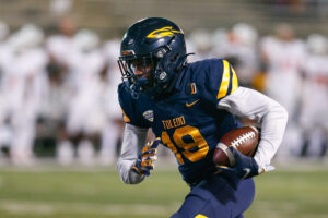 Toledo Rockets wide receiver Jerjuan Newton (19) runs with the ball after catching a pass during a regular season game between the Bowling Green Falcons and the Toledo Rockets on November 4, 2020 at Glass Bowl Stadium in Toledo, Ohio.