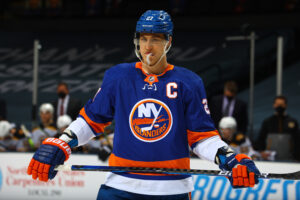 Anders Lee #27 of the New York Islanders in action against the Boston Bruins at Nassau Coliseum on March 09, 2021 in Uniondale, New York.