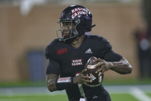 Louisiana-Lafayette Ragin Cajuns quarterback Levi Lewis (1) looks for open receivers downfield during the college football game between the Louisiana Ragin' Cajuns and the South Alabama Jaguars, on October 2, 2021 at Hancock-Whitney Stadium, Mobile, Alabama. 