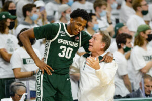 Michigan State Spartans forward Marcus Bingham Jr. (30) listens to instruction from his head coach Tom Izzo during a college basketball game between the Michigan State Spartans and the Grand Valley State Lakers on November 4, 2021 at the Breslin Student Events Center in East Lansing, MI.