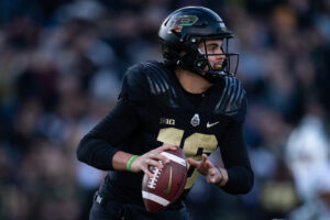 Purdue Boilermakers quarterback Aidan O'Connell (16) scrambles to the sidelines during the college football game between the Purdue Boilermakers and Michigan State Spartans on November 6, 2021, at Ross-Ade Stadium in West Lafayette, IN.