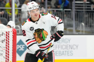 Alex DeBrincat #12 of the Chicago Blackhawks warms up before the game against the Seattle Kraken at Climate Pledge Arena on November 17, 2021 in Seattle, Washington. 