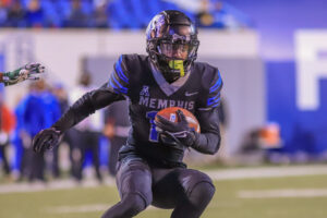 Memphis Tigers wide receiver Eddie Lewis (18) runs during the game between the Memphis Tigers and the Tulane Green Wave on November 27, 2021, at The Liberty Bowl Memorial Stadium in Memphis, TN