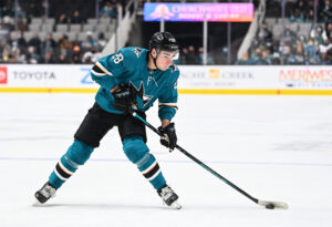 Timo Meier #28 of the San Jose Sharks skates ahead with the puck against the Calgary Flames in a regular season game at SAP Center on December 7, 2021 in San Jose, California.