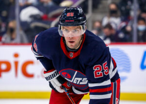 Paul Stastny #25 of the Winnipeg Jets prepares for a first period face-off against the St. Louis Blues at Canada Life Centre on December 19, 2021 in Winnipeg, Manitoba, Canada.