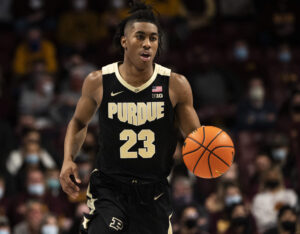 Purdue Boilermakers guard Jaden Ivey brings the ball up the court in a Big Ten basketball game against the Minnesota Golden Gophers