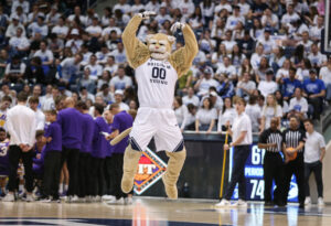  Cosmo the mascot of the Brigham Young Cougars gets the fans going during a time out of the second half of their second round NIT game against the Northern Iowa Panthers March 19, 2022 at the Marriott Center in Provo, Utah. 