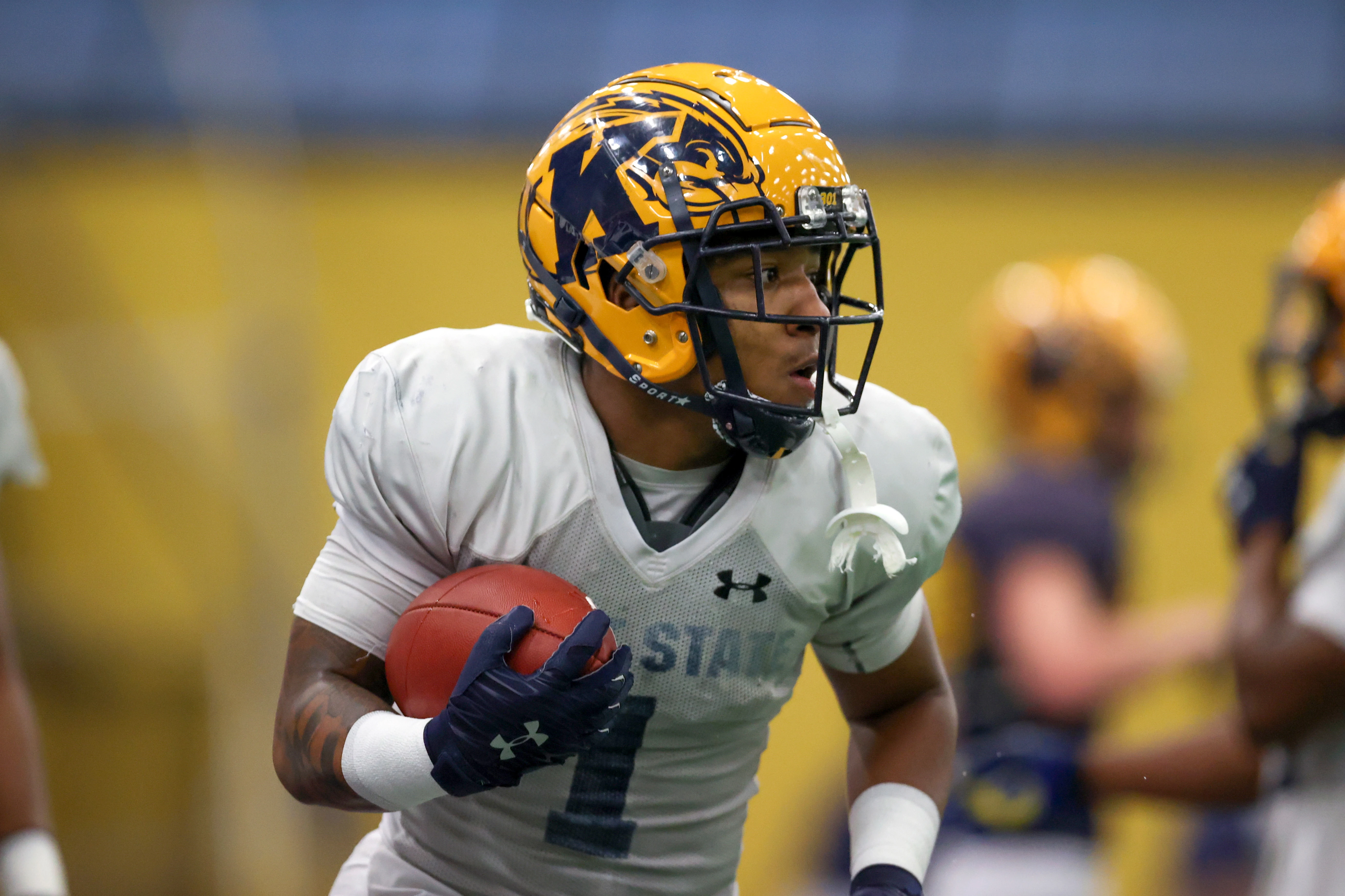 KENT, OH - APRIL 16: Kent State Golden Flashes running back Marquez Cooper (1) participates in drills during the Kent State Golden Flashes spring football game on April 16, 2022, at Dix Stadium in Kent, OH.