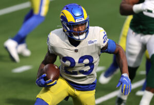 Cam Akers #23 of the Los Angeles Rams rushes the ball during the first half of a game against the New York Jets at SoFi Stadium on December 20, 2020 in Inglewood, California.