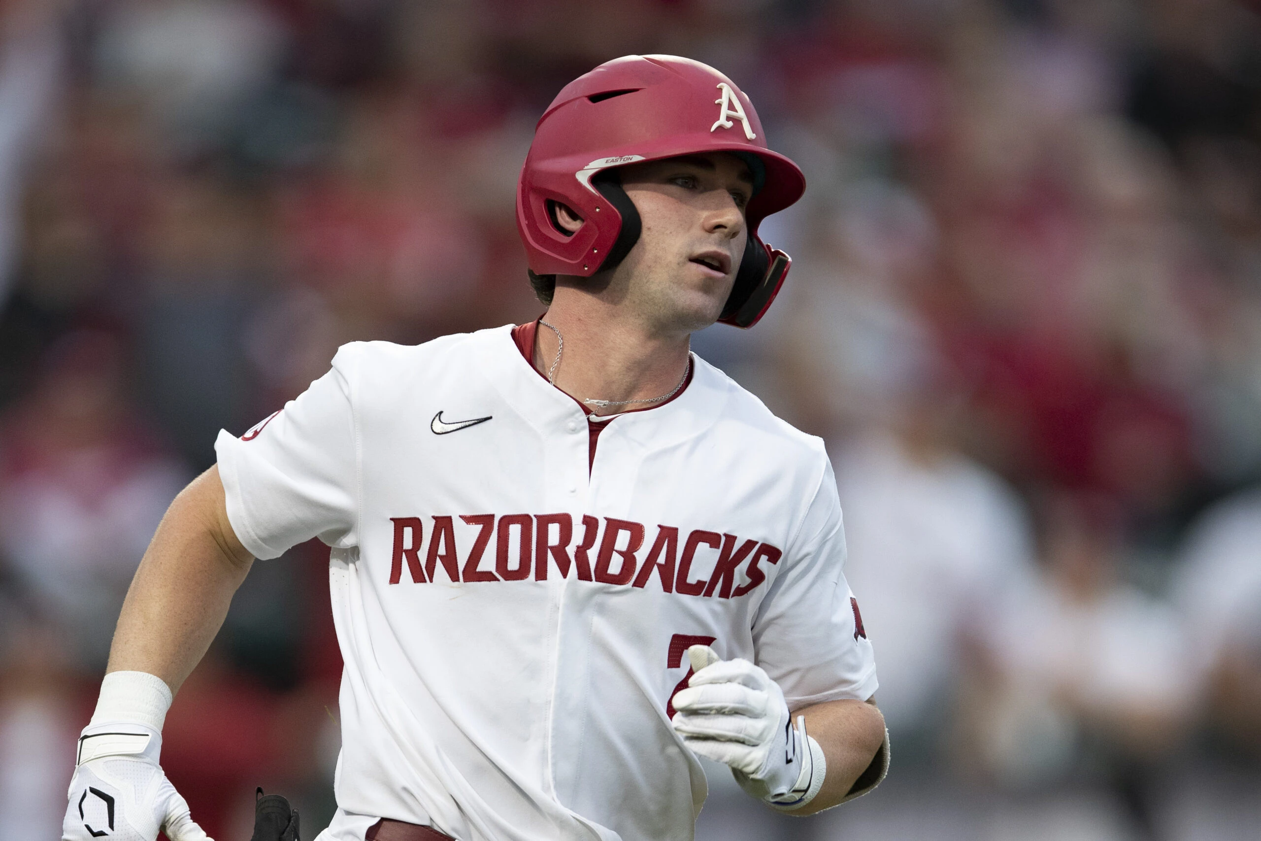 Cayden Wallace #7 of the Arkansas Razorbacks hits a home run during a game against the Florida Gators at Baum-Walker Stadium at George Cole Field on May 20, 2021 in Fayetteville, Arkansas. The Razorbacks defeated the Gators 6-1.