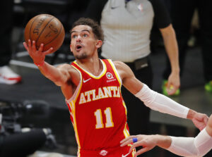 Trae Young goes for a layup in a 2021 home game.