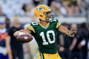 Jordan Love #10 of the Green Bay Packers attempts a pass during the game against the New Orleans Saints at TIAA Bank Field on September 12, 2021 in Jacksonville, Florida.