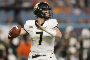 Chase Brice #7 of the Appalachian State Mountaineers throws a pass against the Miami Hurricanes during the first half at Hard Rock Stadium on September 11, 2021 in Miami Gardens, Florida.