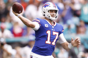 Quarterback Josh Allen #17 of the Buffalo Bills passes the ball in the first half of the game against the Miami Dolphins at Hard Rock Stadium on September 19, 2021 in Miami Gardens, Florida.