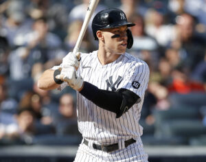 Aaron Judge #99 of the New York Yankees in action against the Tampa Bay Rays at Yankee Stadium on October 02, 2021