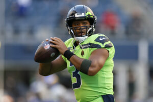 Russell Wilson #3 of the Seattle Seahawks warms up before the game against the Los Angeles Rams at Lumen Field on October 07, 2021 in Seattle, Washington.