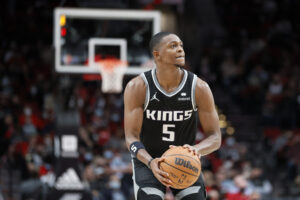 De'Aaron Fox #5 of the Sacramento Kings in action against the Portland Trail Blazers during the third quarter at Moda Center on October 20, 2021 in Portland, Oregon.