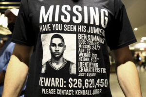 A spectator displays a T-shirt during a game between the Philadelphia 76ers and the Brooklyn Nets at Wells Fargo Center on October 22, 2021 in Philadelphia, Pennsylvania.