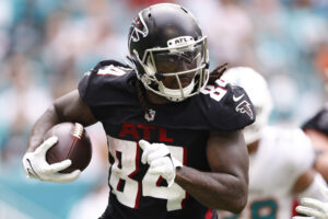 Cordarrelle Patterson #84 of the Atlanta Falcons runs with the ball against the Miami Dolphins during the fourth quarter at Hard Rock Stadium on October 24, 2021 in Miami Gardens, Florida.