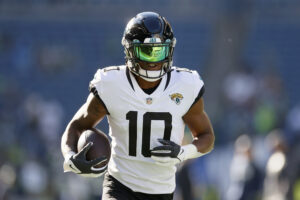 Laviska Shenault Jr. #10 of the Jacksonville Jaguars warms up before the game against the Seattle Seahawks at Lumen Field on October 31, 2021 in Seattle, Washington.