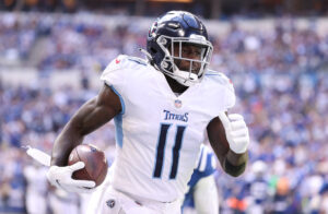 A.J. Brown #11 of the Tennessee Titans runs for a touchdown against the Indianapolis Colts at Lucas Oil Stadium on October 31, 2021 in Indianapolis, Indiana