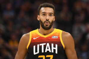 Rudy Gobert #27 of the Utah Jazz looks on during a game against the Oklahoma City Thunder at Vivint Smart Home Arena on October 20, 2021 in Salt Lake City, Utah.