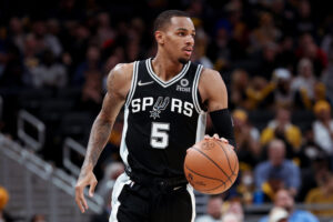 Dejounte Murray #5 of the San Antonio Spurs dribbles the ball in the second quarter against the Indiana Pacers at Gainbridge Fieldhouse on November 01, 2021 in Indianapolis, Indiana.