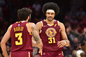 Ricky Rubio #3 celebrates with Jarrett Allen #31 of the Cleveland Cavaliers after Allen scored in the final seconds of the fourth quarter against the Boston Celtics at Rocket Mortgage Fieldhouse on November 13, 2021 in Cleveland, Ohio.