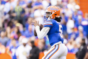 Emory Jones #5 of the Florida Gators looks to pass during the second quarter of a game against the Samford Bulldogs at Ben Hill Griffin Stadium on November 13, 2021 in Gainesville, Florida. 